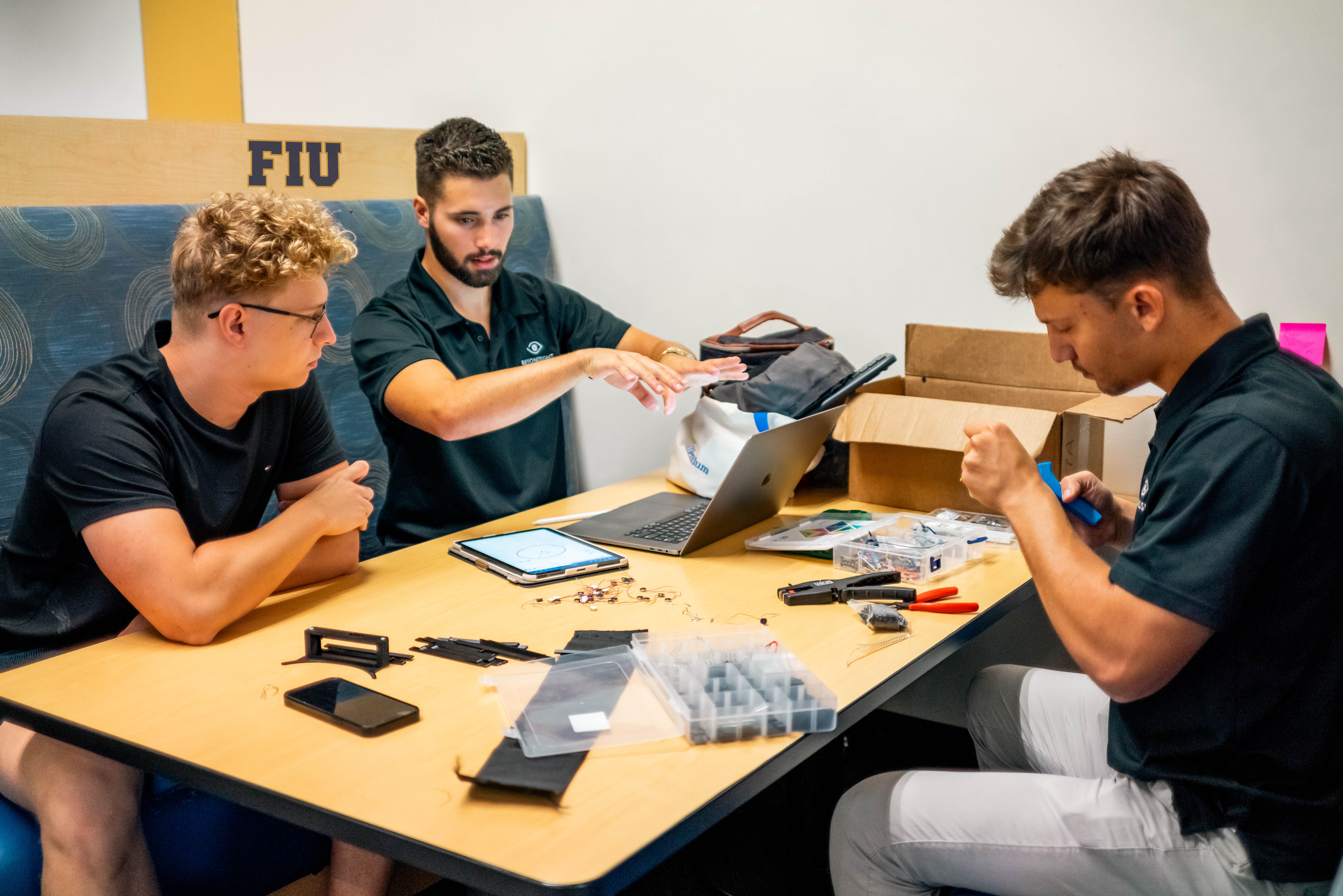 Beyond Sight team working on the next prototype at the Green Library