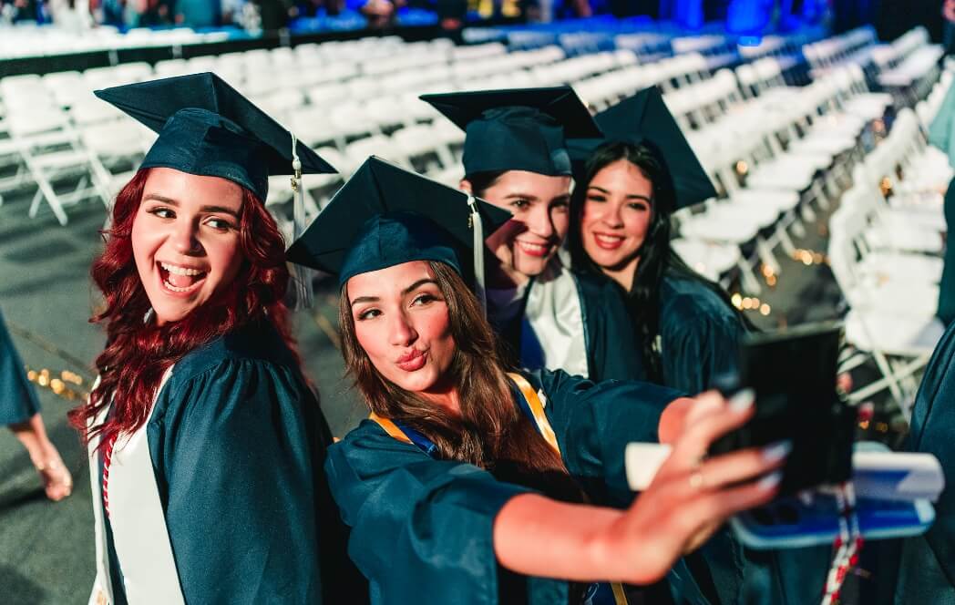 Graduates taking a selfie