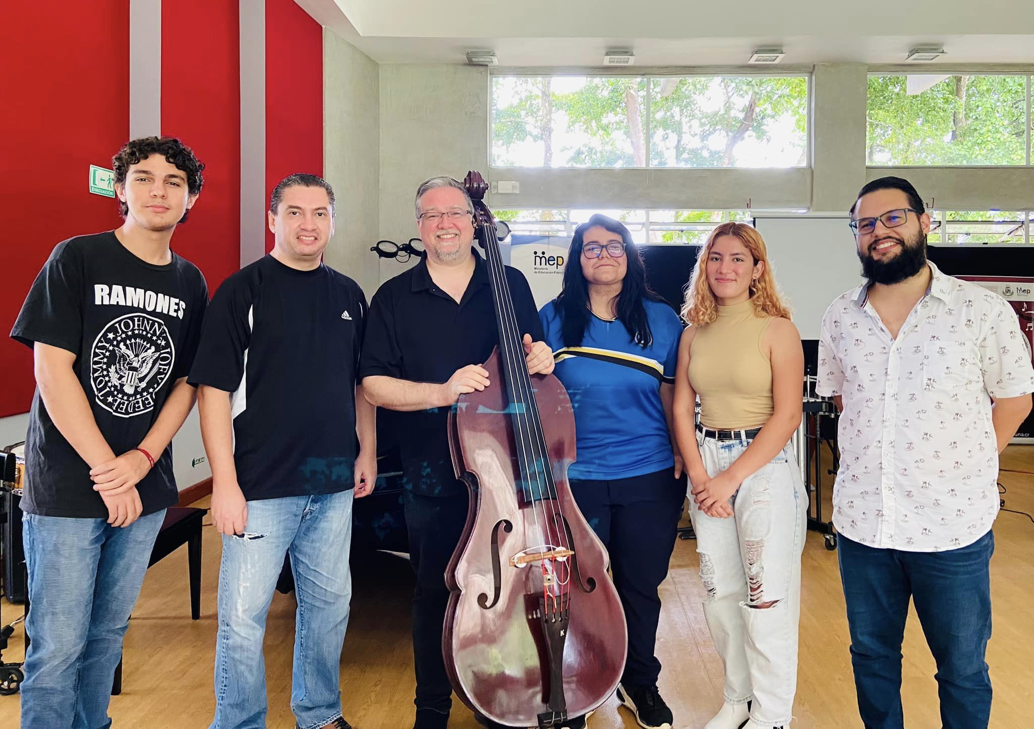 J. Ousley (3rd from left) with students and faculty at National University of Costa Rica