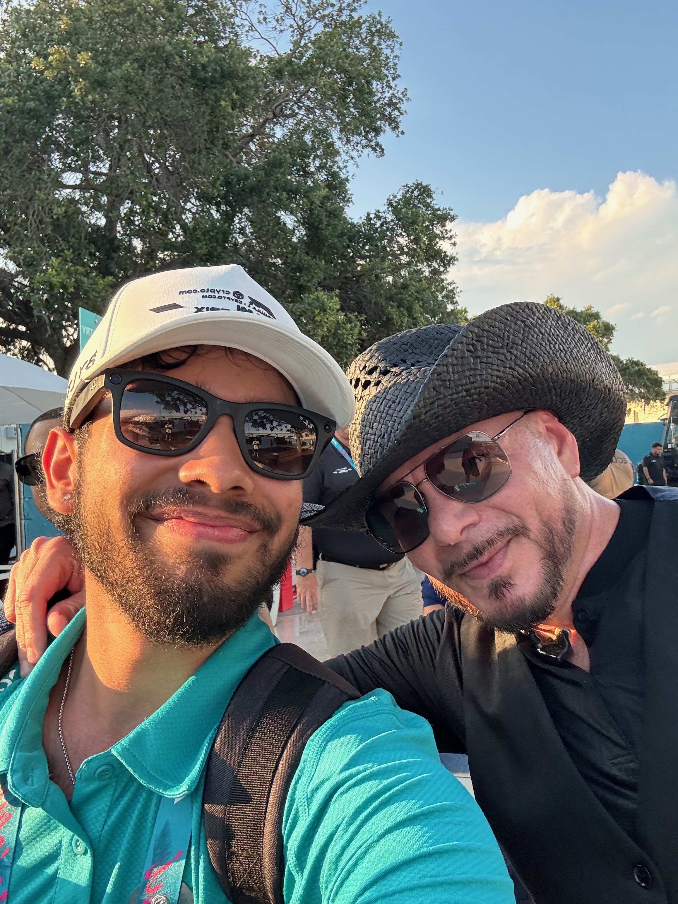 FIU Hospitality intern Marc Funes takes a selfie with our very own Pitbull.