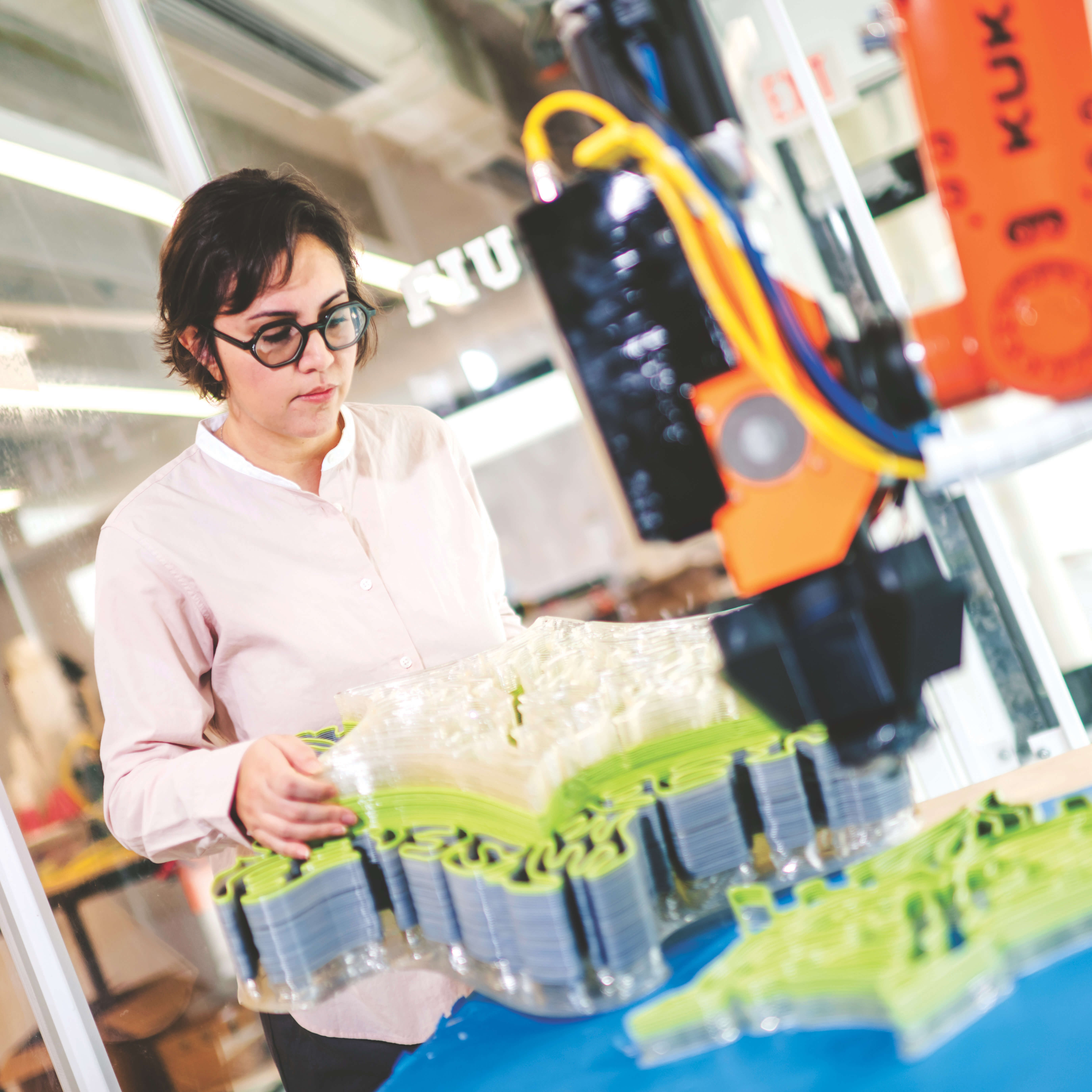 Sara Pezeshk with one of her Ecoblox in FIU’s Robotics and Digital Fabrication Lab.